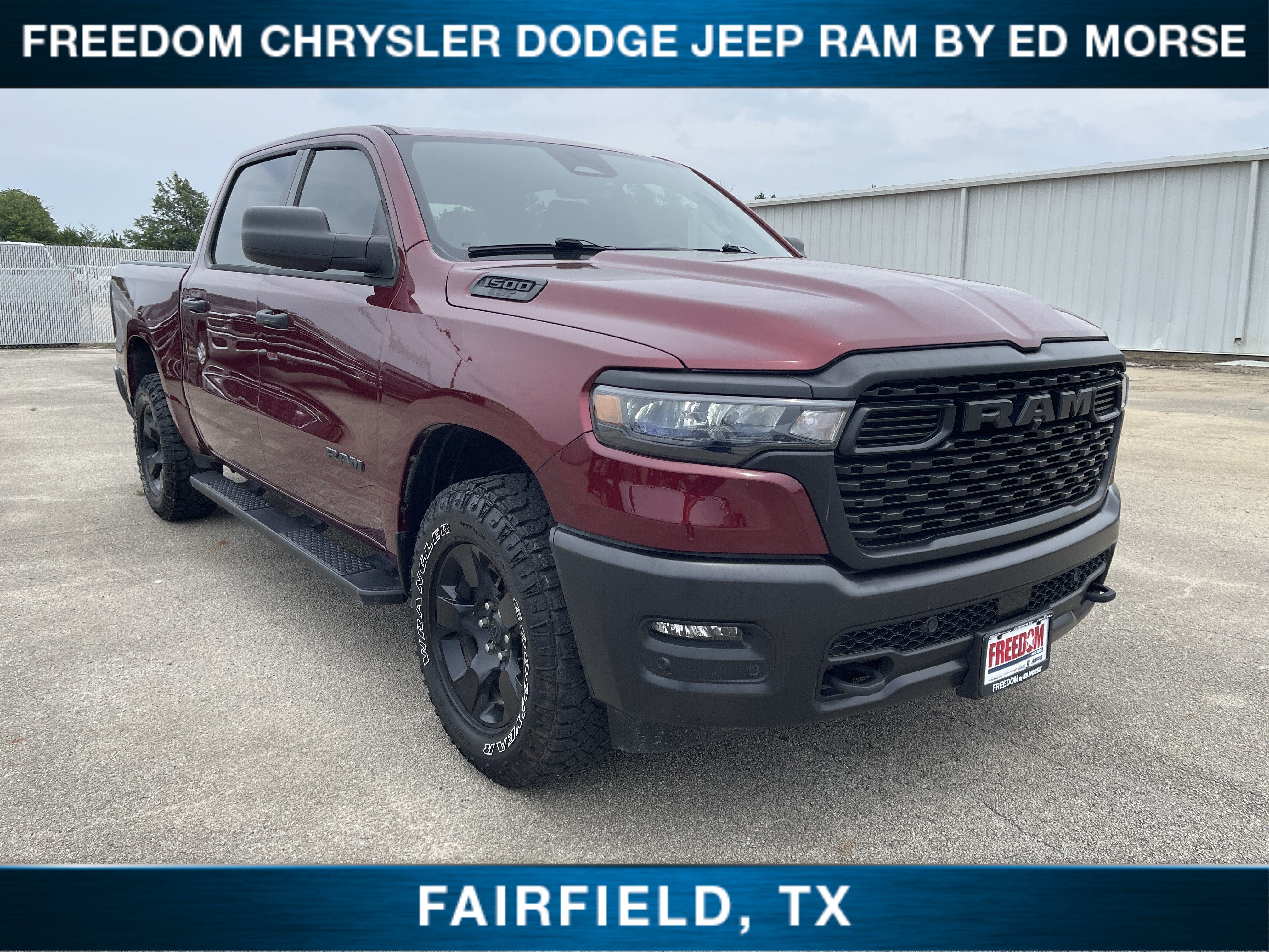 2025 RAM 1500 Warlock in Delmonico Red Pearlcoat — front three-quarter view