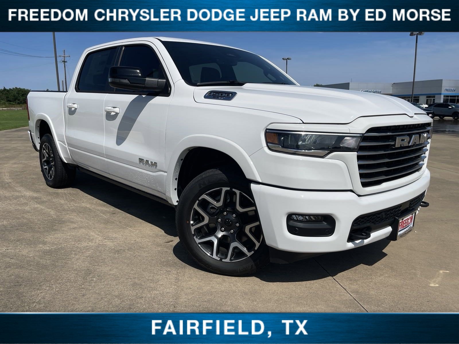 2025 RAM 1500 Laramie in Bright White Clearcoat — front three-quarter view