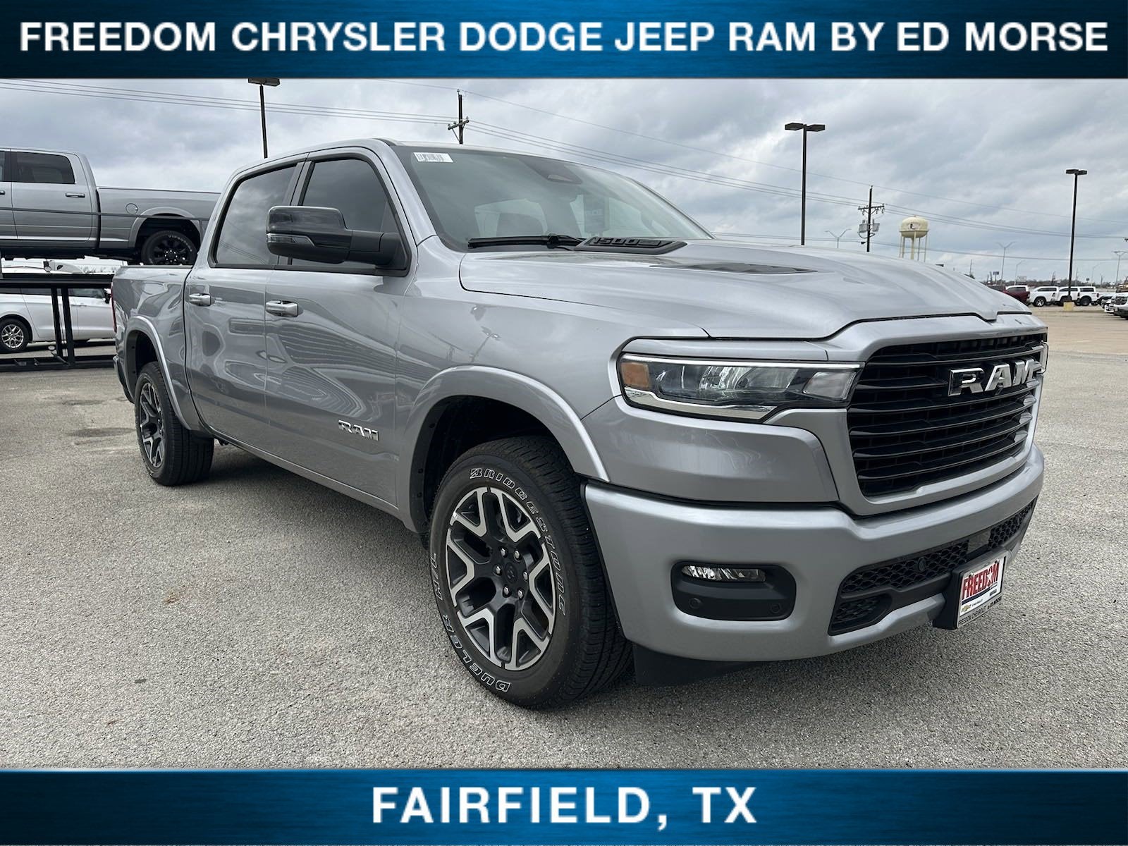 2025 RAM 1500 Laramie in Billet Silver Metallic Clearcoat — front three-quarter view