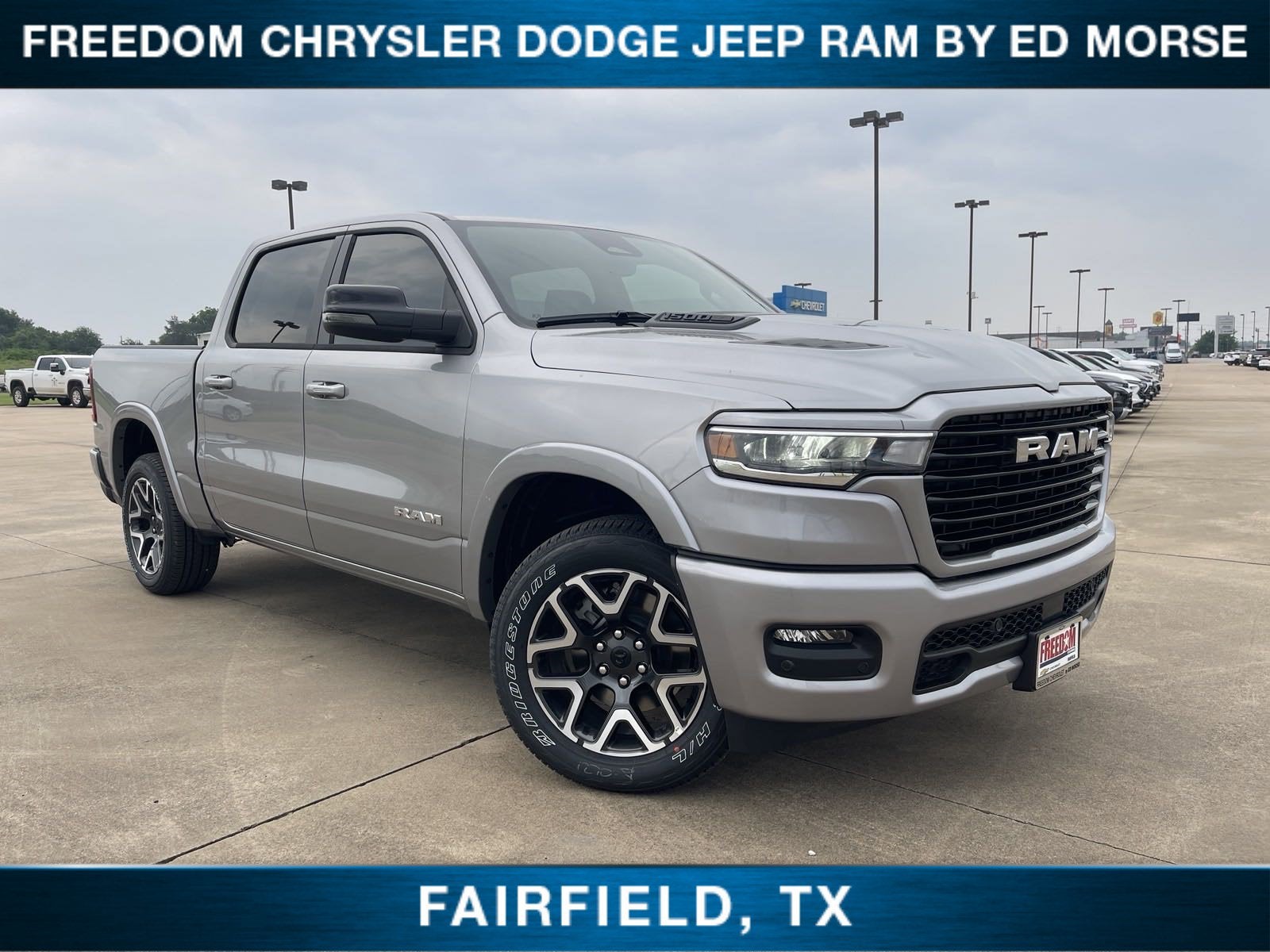 2025 RAM 1500 Laramie in Billet Silver Metallic Clearcoat — front three-quarter view