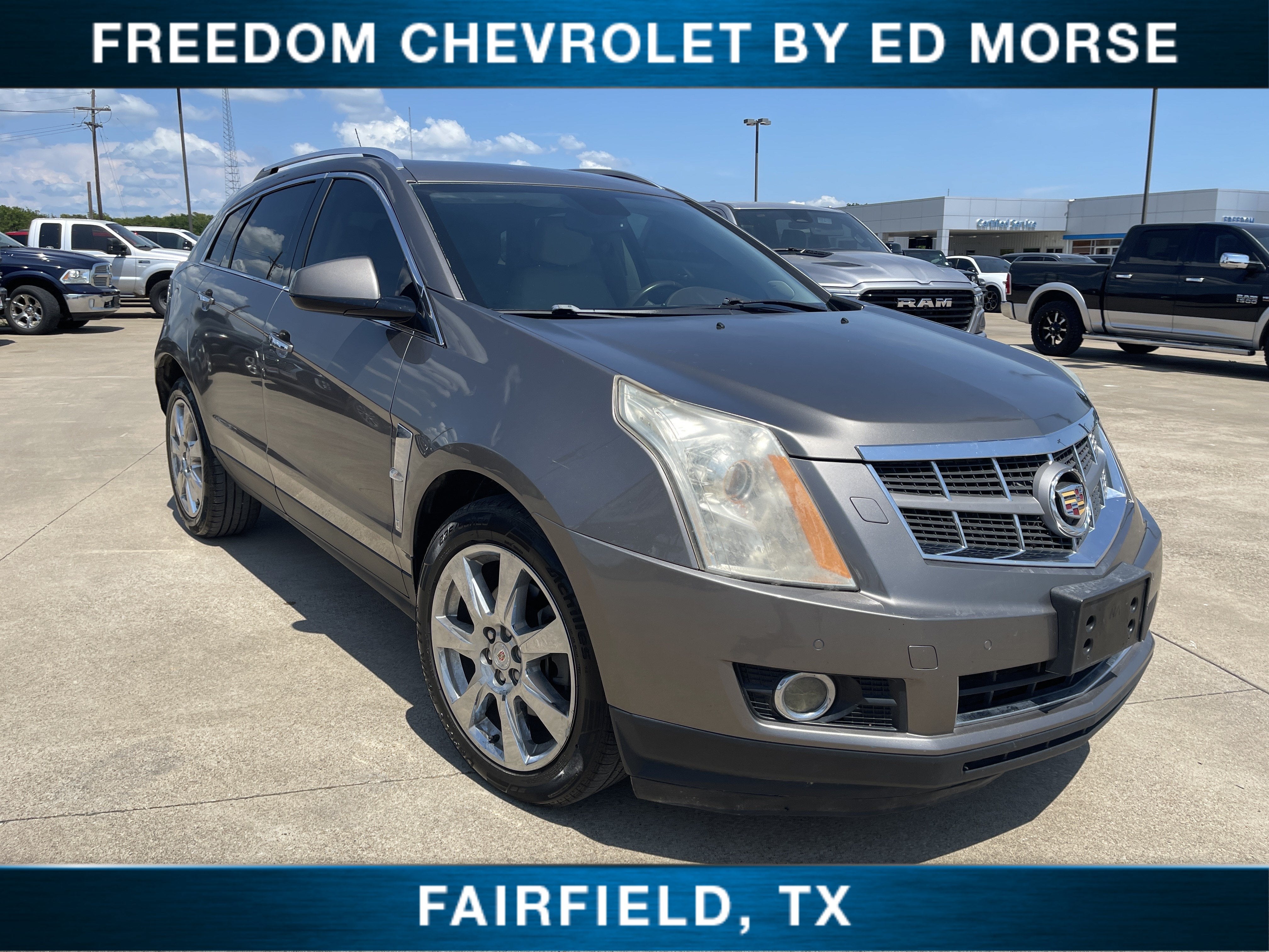 2012 Cadillac SRX Performance Collection in Mocha Steel Metallic — front three-quarter view